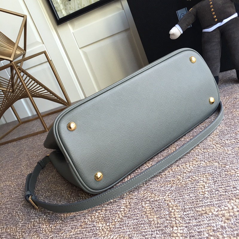 Pra*a top handle bags